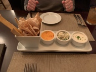 House-made chips and crackers with crab dip, pimento cheese dip, and shallot crème fraîche.